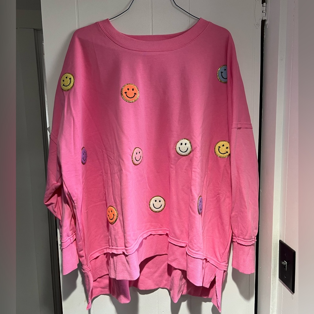 Smiley face crewneck sweater